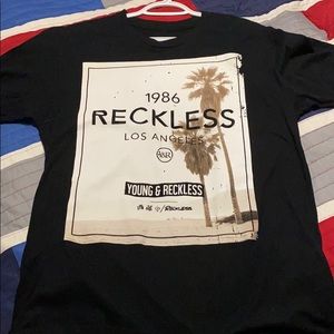 Make an offer! Young & Reckless T shirt medium.